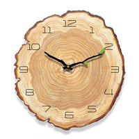Horloge en rondin de bois, aiguilles en forme de branche