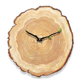 Horloge en rondin de bois, aiguilles en forme de branche