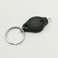 Mini lampe LED porte clé avec pile bouton. Photon Micro-Light de poche