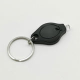 Mini lampe LED porte clé avec pile bouton. Photon Micro-Light de poche