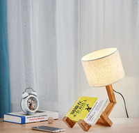 Lampe bonhomme articulé en bois, luminaire design original