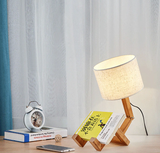 Lampe bonhomme articulé en bois, luminaire design original
