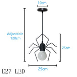 Luminaire bonhomme design LED, balançoire ou araignée, plafonnier original et moderne en métal