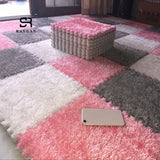 Tapis puzzle DIY à créer soi-même. Carreaux de 30x30cm à ajuster