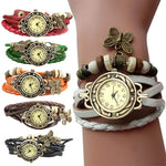 Montre vintage pour femme, avec bracelet multiple en cuir, et pendentif papillon