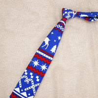 Cravates de Noël rigolotes avec motifs de père noël, bonhomme de neige, sapin, flocons, etc