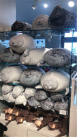 Peluche lion de mer géant, ressemblant à une otarie ou un phoque
