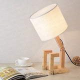 Lampe bonhomme articulé en bois, luminaire design original