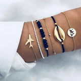 Bracelet multiple, ancre, signe infini, flèche, love, cœur, terre, boussole, coquillage