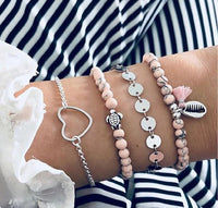 Bracelet multiple, ancre, signe infini, flèche, love, cœur, terre, boussole, coquillage