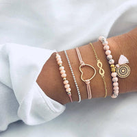 Bracelet multiple, ancre, signe infini, flèche, love, cœur, terre, boussole, coquillage