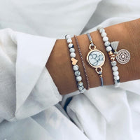 Bracelet multiple, ancre, signe infini, flèche, love, cœur, terre, boussole, coquillage