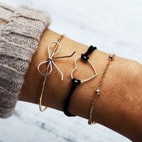 Bracelet multiple, ancre, signe infini, flèche, love, cœur, terre, boussole, coquillage