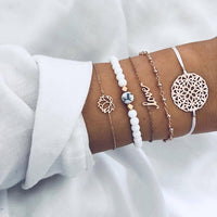 Bracelet multiple, ancre, signe infini, flèche, love, cœur, terre, boussole, coquillage
