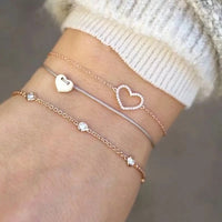 Bracelet multiple, ancre, signe infini, flèche, love, cœur, terre, boussole, coquillage