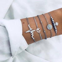 Bracelet multiple, ancre, signe infini, flèche, love, cœur, terre, boussole, coquillage