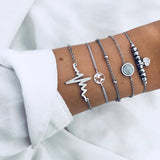 Bracelet multiple, ancre, signe infini, flèche, love, cœur, terre, boussole, coquillage