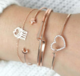 Bracelet multiple, ancre, signe infini, flèche, love, cœur, terre, boussole, coquillage