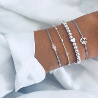 Bracelet multiple, ancre, signe infini, flèche, love, cœur, terre, boussole, coquillage