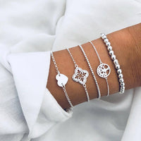 Bracelet multiple, ancre, signe infini, flèche, love, cœur, terre, boussole, coquillage
