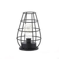 Lampe avec ampoule dans une bouteille ou un verre. Luminaire design métal original et moderne