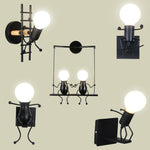 Luminaire design balançoire LED, applique murale originale et moderne, bonhomme minimaliste