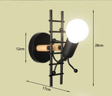 Luminaire design balançoire LED, applique murale originale et moderne, bonhomme minimaliste