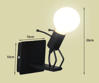 Luminaire design balançoire LED, applique murale originale et moderne, bonhomme minimaliste