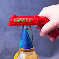 Pistolet décapsuleur Caps Gun. Jeu apéro arme factice pour capsule de bière