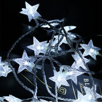 Guirlande lumineuse avec flocons de neige ou points lumineux