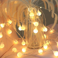 Guirlande lumineuse avec flocons de neige ou points lumineux
