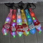 Cravate de Noël lumineuse et colorée qui clignote (père noël, bonhomme de neige, sapin, flocons, etc)