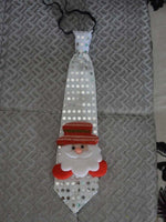 Cravate de Noël lumineuse et colorée qui clignote (père noël, bonhomme de neige, sapin, flocons, etc)