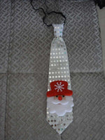 Cravate de Noël lumineuse et colorée qui clignote (père noël, bonhomme de neige, sapin, flocons, etc)