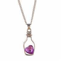 Chaîne avec pendentif cœur dans une bouteille