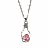 Chaîne avec pendentif cœur dans une bouteille