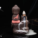 Fontaine d'encens, avec cascade de fumée. Porte encens zen moine bouddha yoga