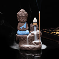 Fontaine d'encens, avec cascade de fumée. Porte encens zen moine bouddha yoga