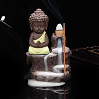 Fontaine d'encens, avec cascade de fumée. Porte encens zen moine bouddha yoga