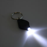Mini lampe LED porte clé avec pile bouton. Photon Micro-Light de poche