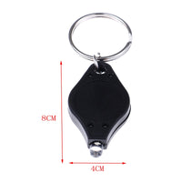 Mini lampe LED porte clé avec pile bouton. Photon Micro-Light de poche